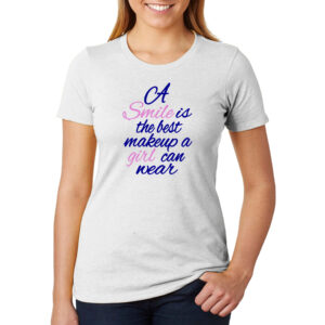 White shirt that reads in cursive, "A smile is the best makeup a girl can wear"